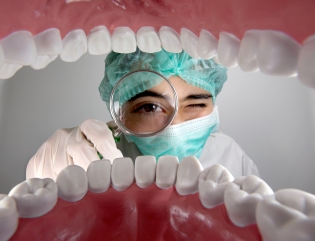 Dentist Looking Glass Teeth